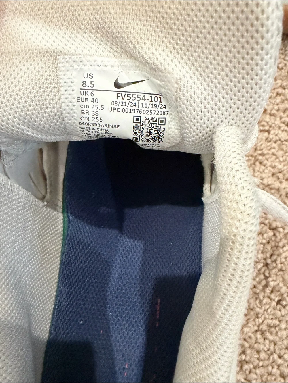 Nike White Sneakers with Navy Swoosh and Gum Outsole
